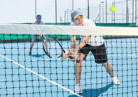 Sportsman ready to hit volley.の写真素材