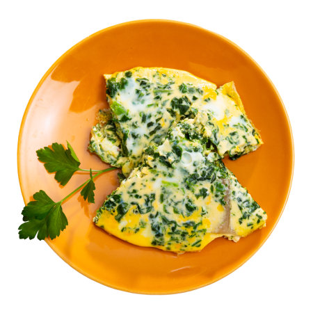 Appetizing breakfast omelette with spinachの写真素材