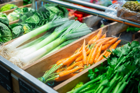 Market counter with assortment of farm fresh organic vegetablesの写真素材