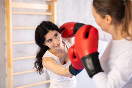 women show their boxing prowessの写真素材