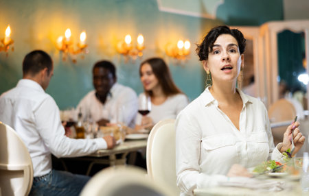 Woman at the restaurantの写真素材
