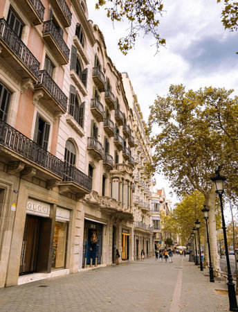 SPAIN, BARCELONA - SEPTEMBER 3, 2023: Passeig de Gracia, one of main avenues of Barcelona, Spainのeditorial素材
