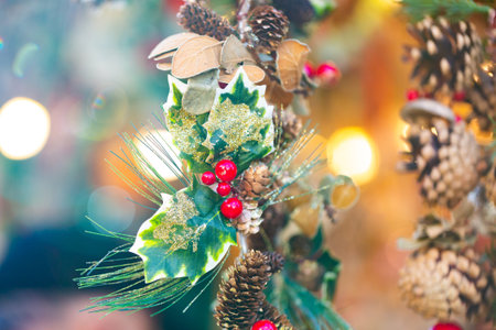 Christmas background with wooden garland decorations at outdoors market closeup