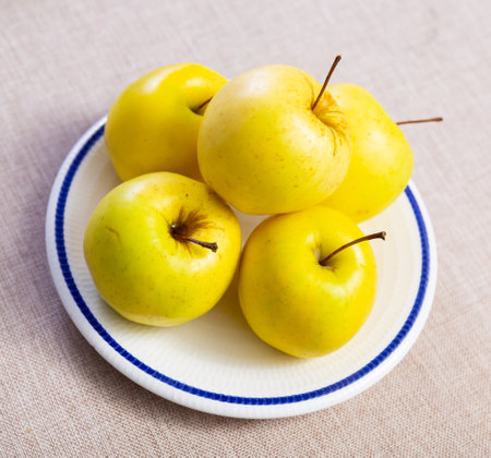 Juicy apple fruits served to tableの写真素材