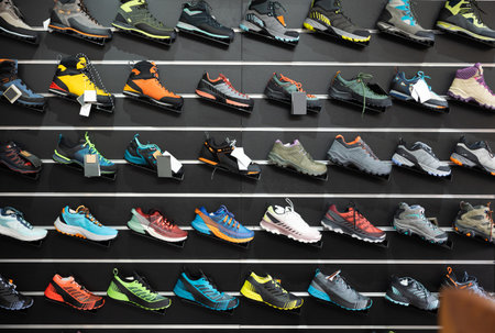 Various sports shoes for hiking and climbing in sports storeの写真素材