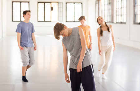 Young artists performing uncommon danceの写真素材
