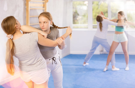 Females practicing self defence movesの写真素材