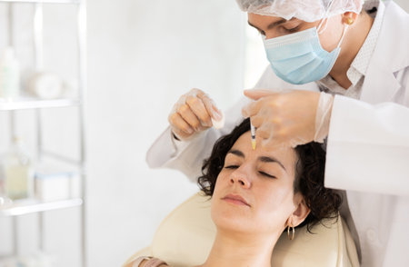 Facial injection female patientの写真素材