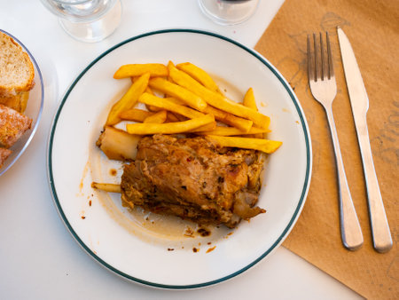 Close up of delicious fried knuckle with potatoesの写真素材