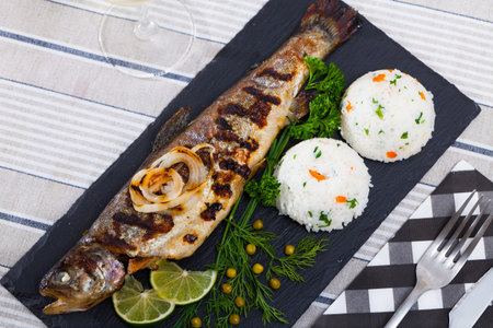 Baked trout with rice