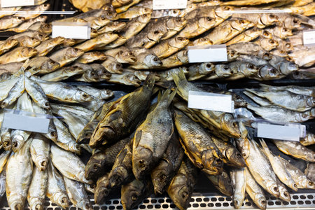 Cured herring and other fish in supermarketの写真素材