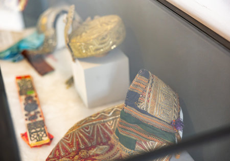 TUNIS, TUNISIA - APRIL 2 2024: Exhibition of womens headdresses at Bardo Museum, Tunisia
