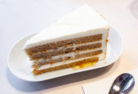 Slice of delicate carrot cake