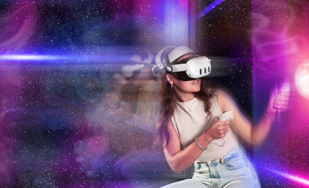 Girl immersed in futuristic virtual reality game with cosmic visualsの写真素材
