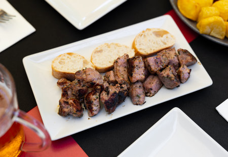 Moorish chicken skewers served with bread