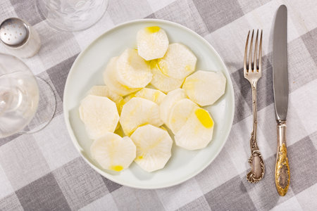 Sliced fresh turnips on the dining tableの写真素材