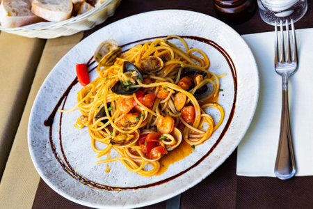 Delicious spaghetti of shrimps, mussels and vegetablesの写真素材