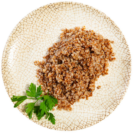 There is portion of boiled buckwheat porridge on plateの写真素材