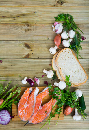 Food frame with fish and vegetablesの写真素材