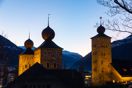 External view of towers of Stockalper Palace in eveningの写真素材