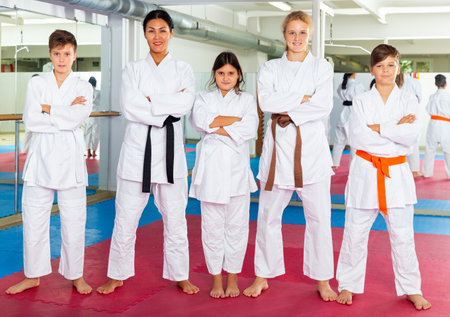 Portrait of coach with his karate students in sports clubの写真素材