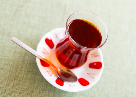 Turkish tea in traditional glass served in cafe