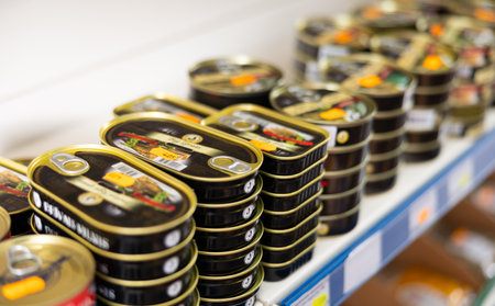 BADALONA, SPAIN - February 12, 2024: Russian-made canned fish on the shelves of Russian grocery store in Spainのeditorial素材