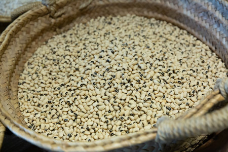 Dried bean in wicker basketの写真素材