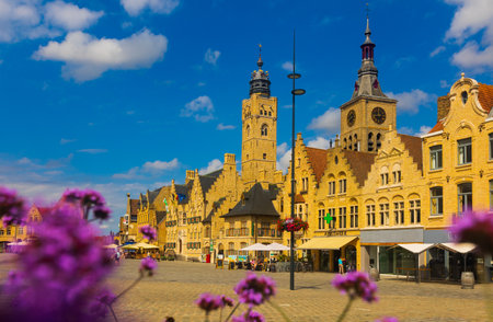 Beautiful view of colorful city Diksmuide with flowers and Grote Markt, West Flanders, Belgiumのeditorial素材