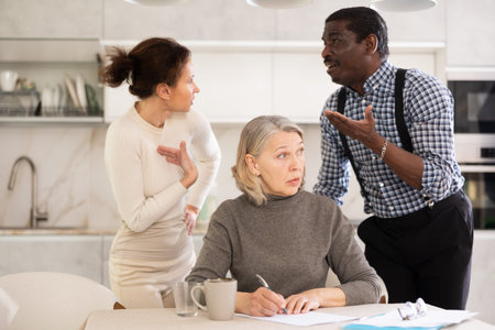 Couple discussing testament with elderly woman