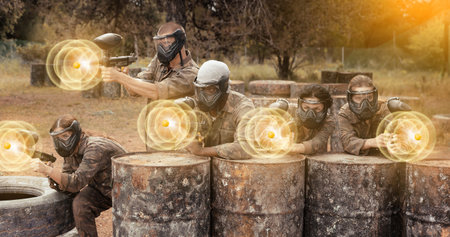 Paintball players of opposite teams in shootoutの写真素材