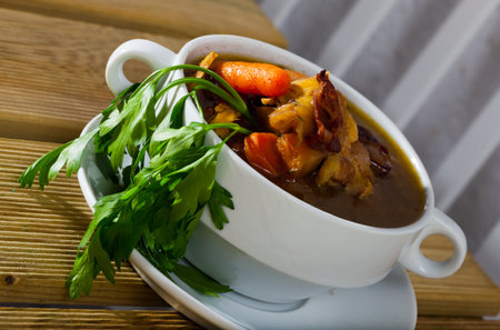 Scottish traditional soup of chicken, bacon and leek, served in bowlの写真素材