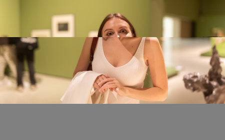 Woman at the Photo Exhibitionの写真素材