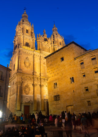 SALAMANCA, SPAIN - APRIL 13, 2022: View of the palace of the Casa de las Conchas and the Church of the La Clereciaのeditorial素材