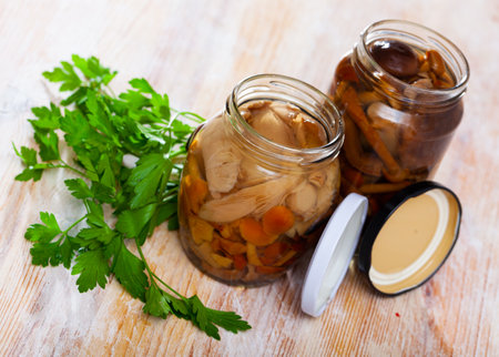Close-up of delicious marinated mushrooms assortedの写真素材