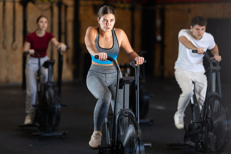 Woman in the top is engaged in an airbike