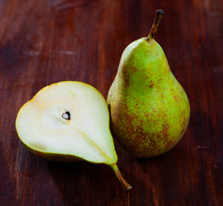 Whole and halved pearsの写真素材