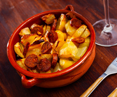Baked potato with chorizoの写真素材