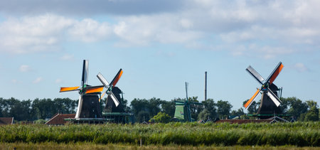 Colorful ancient windmills at Zaandam in Netherlandsの写真素材