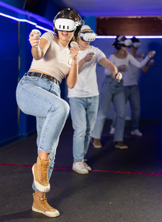 Girl playing active video gamesの写真素材
