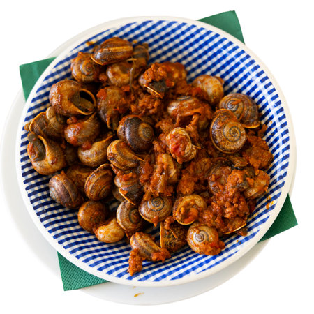 Shellfish snail cooked with minced meat and tomato dressingの写真素材
