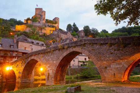 Old stony bridge dated 15th century over Aveyron river. Les Plus Beaux Villages de France (Most...
