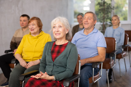 Adult students listening in classroom universityの写真素材