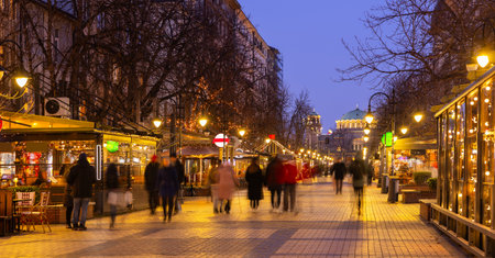 People walk along the Vitosha Boulevard in the city of Sofiaの写真素材