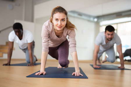 Men and woman training fitness together