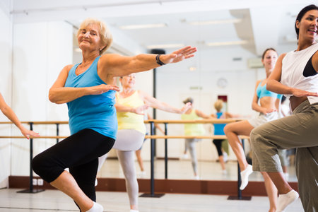 Women dancing together in studioの写真素材