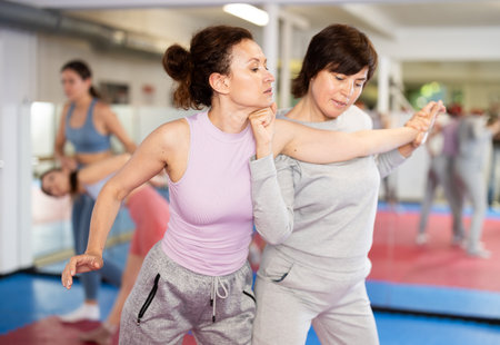 Women and girls in self-defense classの写真素材