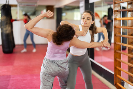 Women and girls in self-defense classの写真素材