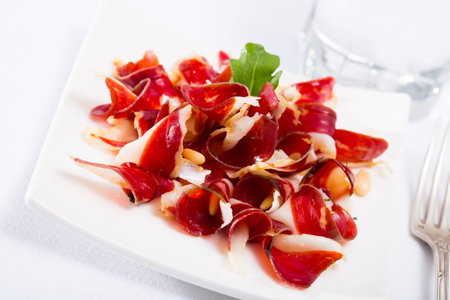 Plate of appetizing duck jamonの写真素材