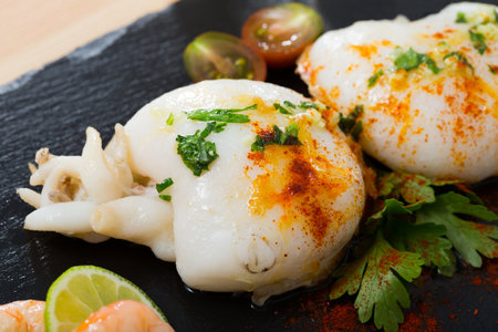 Roasted cuttlefish with paprika and parsleyの写真素材